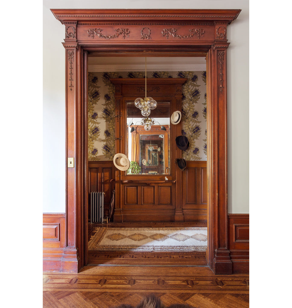 Pendant - 5 Globes (Brushed brass/Clear) — Brooklyn, New York. Interior by Elizabeth Roberts. Image by Dustin Aksland
