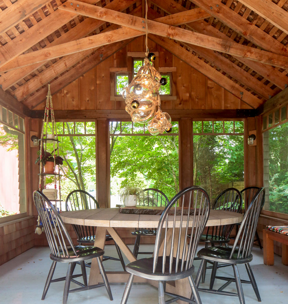 Chandelier – 1 Lg, 2 Sm Bubbles, 5 Barnacles (Khaki/Clear) — Bellport, New York. Interior by Elizabeth Roberts Architects. Image by Eric Striffler