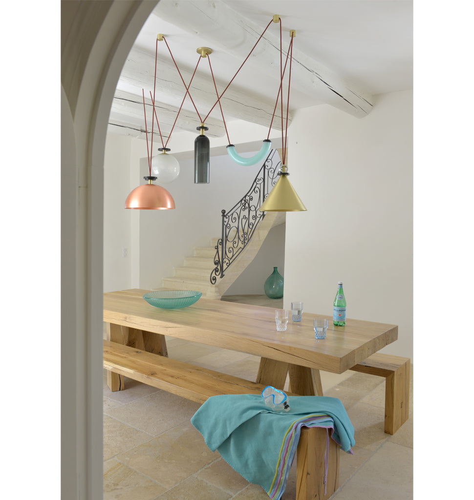 5-Piece Chandelier (Brushed brass cone/Brushed copper hemisphere) — Cassis, France. Interior by David Price. Image by Hervé Hôte